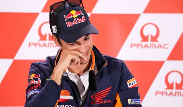 TOPSHOT - Spain's Dani Pedrosa attends a press conference ahead the MotoGP race of the motorcycling Grand Prix at the Sachsenring in Hohenstein-Ernstthal on July 12, 2018. Spain's Dani Pedrosa, three-times a world MotoGP championship runner-up, announced he will retire at the end of the season. The 32-year-old Honda pilot, who won the 125cc category in 2003 and 250cc in 2004 and 2005, currently sits in 12th spot of the MotoGP standings ahead of this weekend's German race in Sachsenring.  / AFP PHOTO / dpa / Jan Woitas / Germany OUT